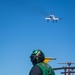 A T-45C Goshawk Flies Over The Flight Deck