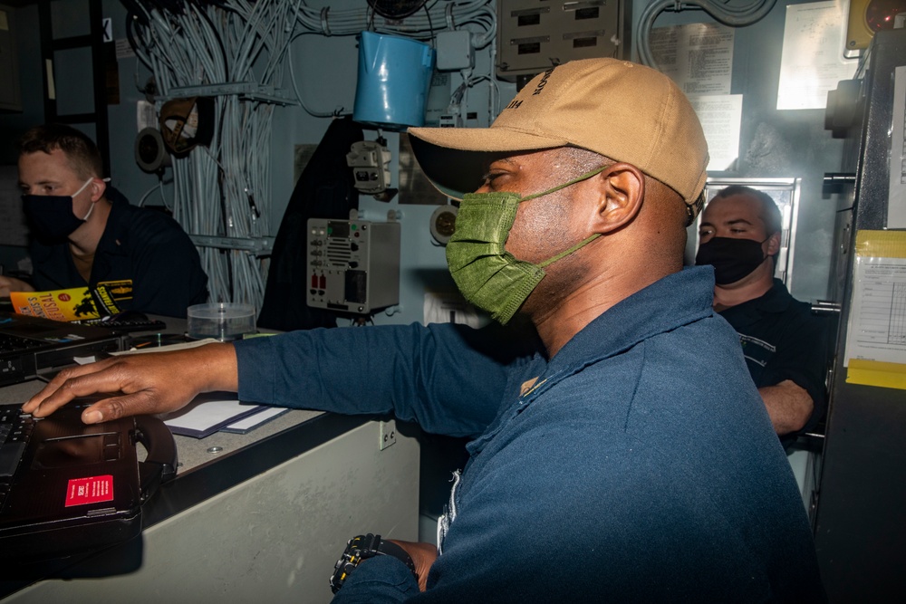 Sailors Stand Watch Aboard USS Ralph Johnson (DDG 114)