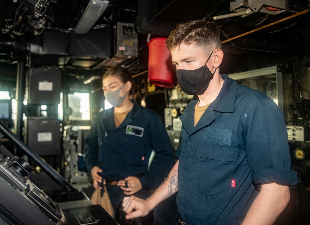 Sailors Stand Watch Aboard USS Ralph Johnson (DDG 114)