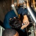 Sailors Aboard USS Ralph Johnson (DDG 114) Conduct Maintenance