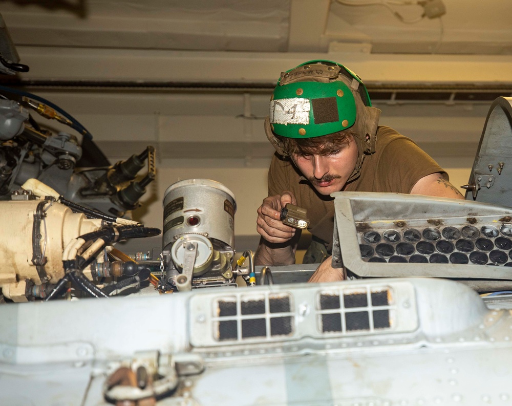 Sailors Aboard USS Ralph Johnson (DDG 114) Conduct Aircraft Maintenance