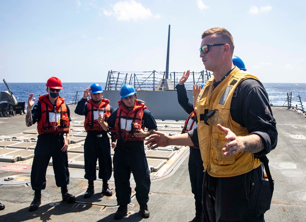 Sailors Aboard USS Ralph Johnson (DDG 114) Conduct Replenishment-at-Sea with USNS Guadalupe (T-AO-200)
