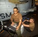 Sailors Aboard USS Ralph Johnson (DDG 114) Conduct Aircraft Maintenance