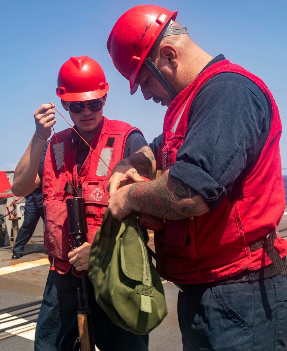 Sailors Aboard USS Ralph Johnson (DDG 114) Conduct Replenishment-at-Sea with USNS Guadalupe (T-AO-200)