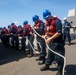 Sailors Aboard USS Ralph Johnson (DDG 114) Conduct Replenishment-at-Sea with USNS Guadalupe (T-AO-200)