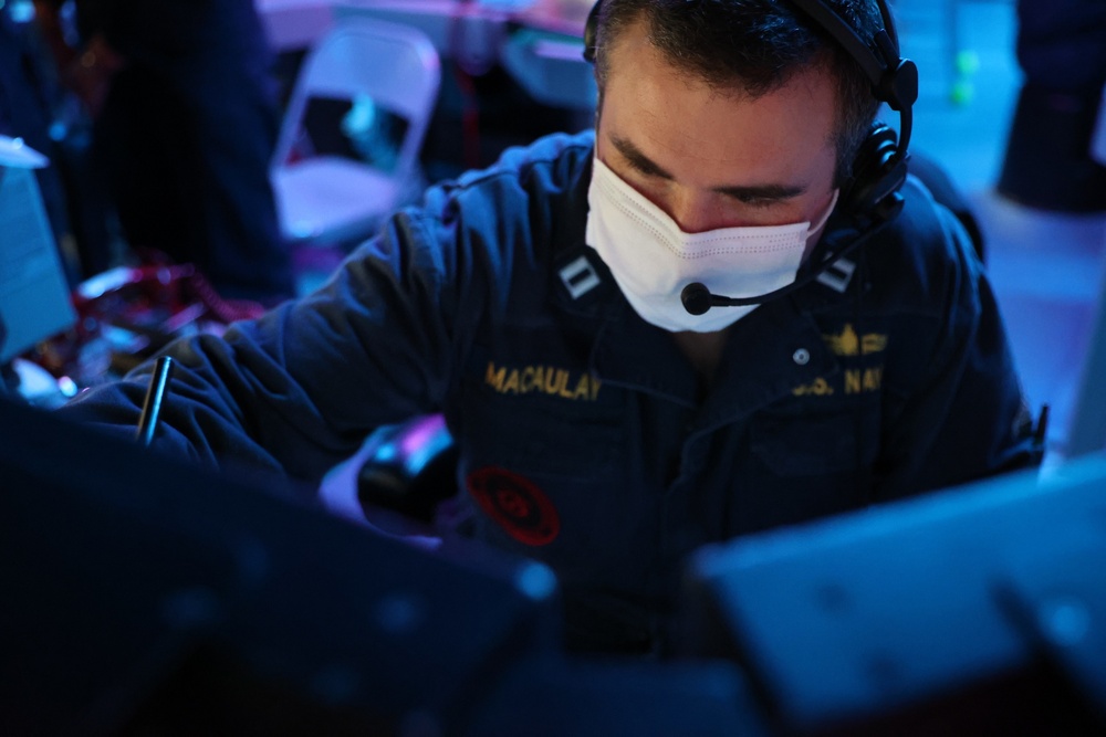 Lt. Whit Macaulay stands Tactical Action Officer watch onboard Arleigh-Burke class guided-missile destroyer USS Barry