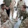 Kuwaiti and U.S. Soldiers exchange medical knowledge