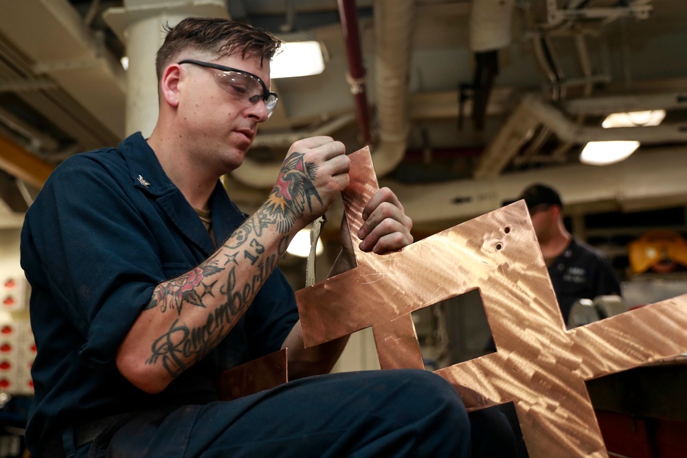 Abraham Lincoln Sailors conduct maintenance