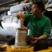 Abraham Lincoln Sailors conduct aircraft maintenance