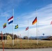 American and NATO Allied and Partner Flags Fly at Half Mast