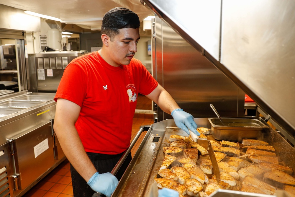 Abraham Lincoln Sailors prepare food