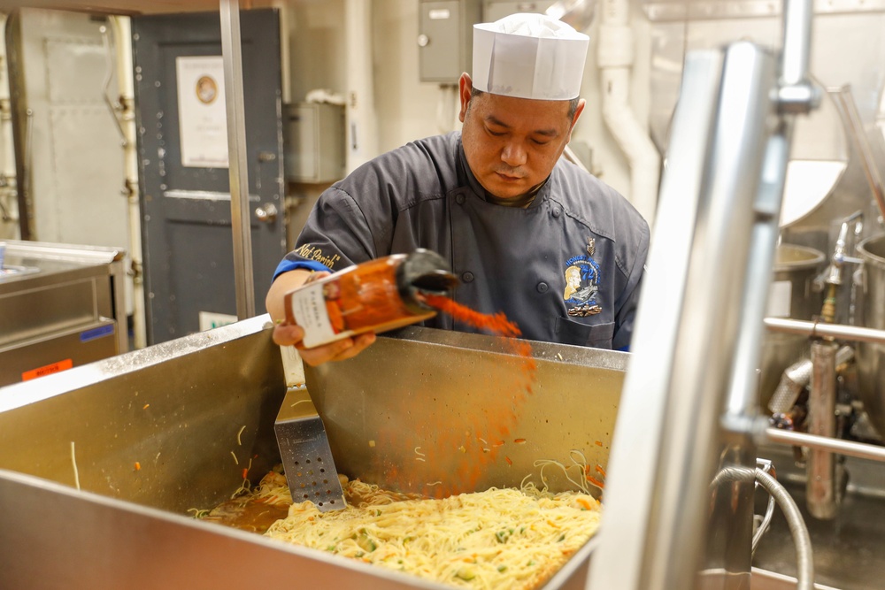 Abraham Lincoln Sailors prepare food