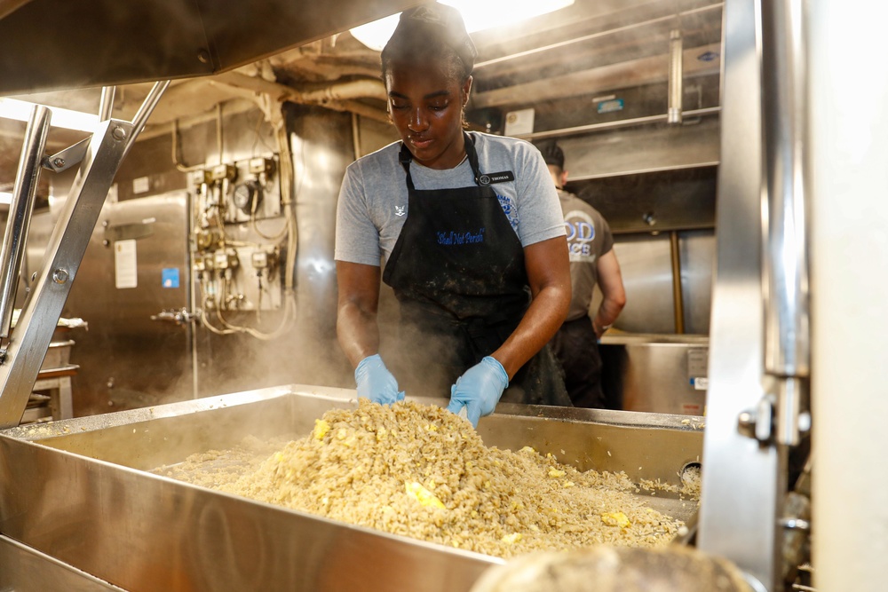 Abraham Lincoln Sailors prepare food