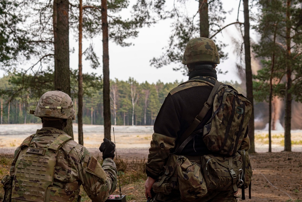 Polish, U.S. Paratroopers detonate ordnance during combined training event