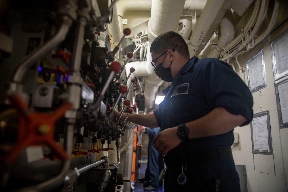 Sailors Aboard USS Ralph Johnson (DDG 114) Conduct Daily Sanitization