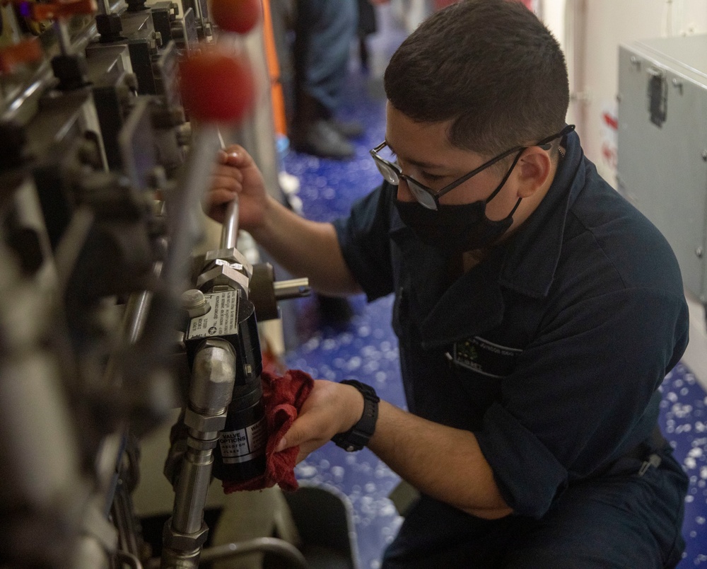 Sailors Aboard USS Ralph Johnson (DDG 114) Conduct Daily Sanitization
