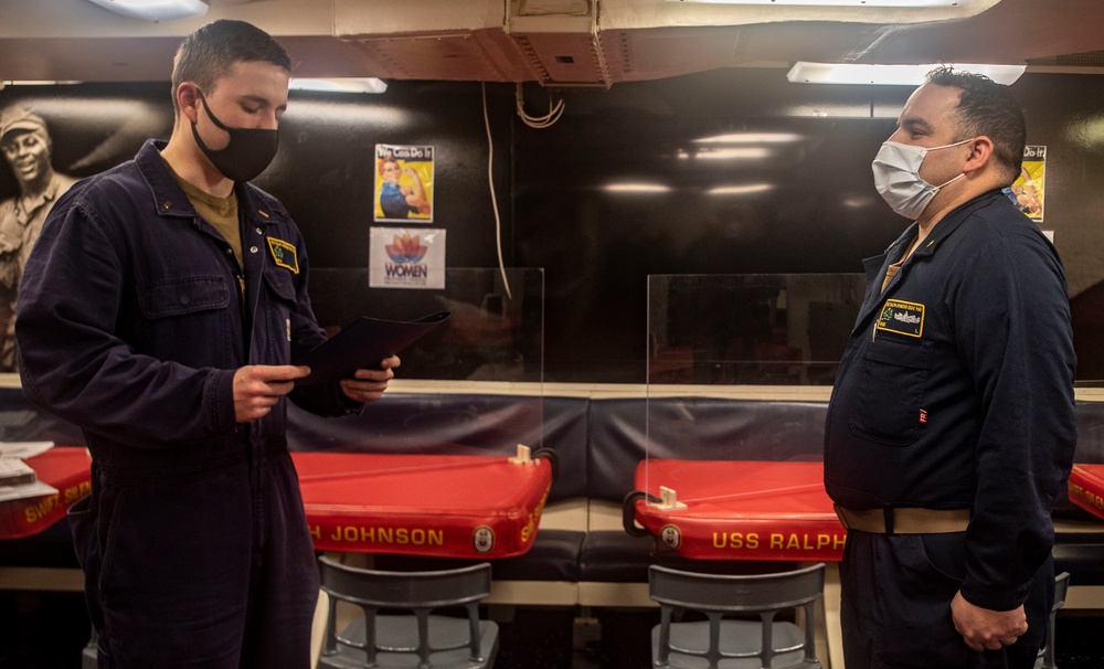 A Sailor Re-Enlists Aboard USS Ralph Johnson (DDG 114)