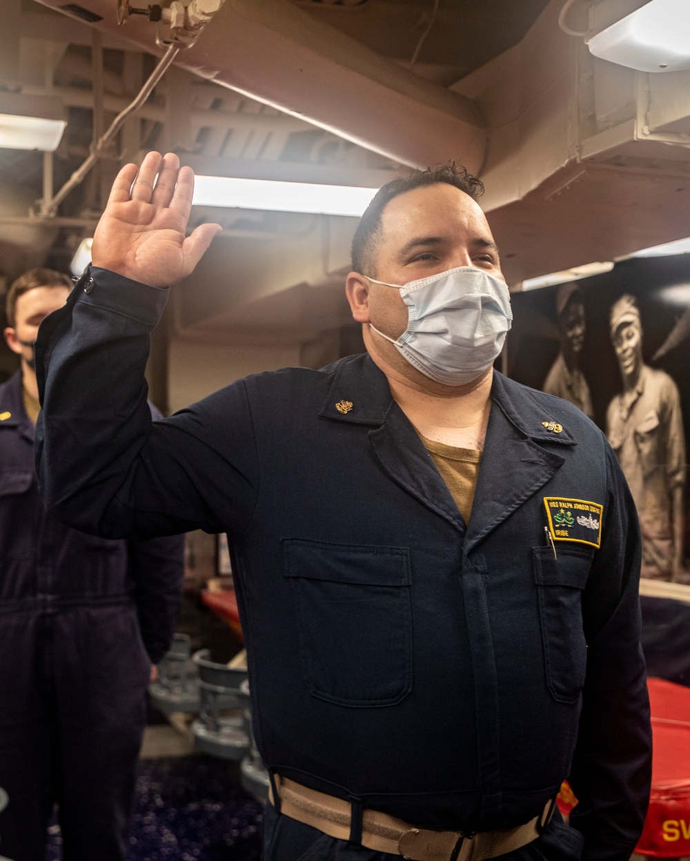 A Sailor Re-Enlists Aboard USS Ralph Johnson (DDG 114)