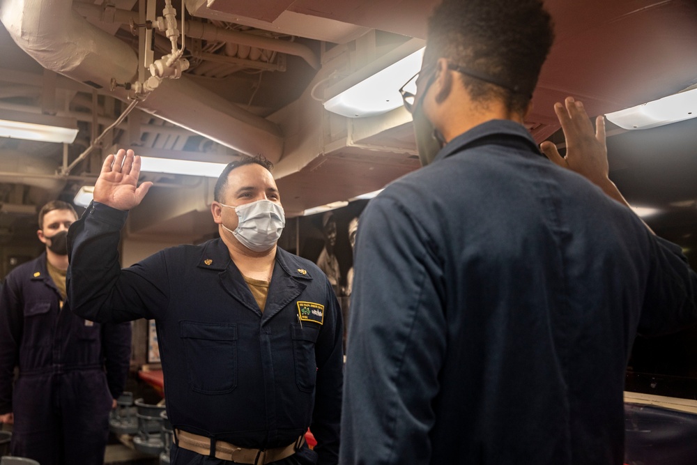 A Sailor Re-Enlists Aboard USS Ralph Johnson (DDG 114)