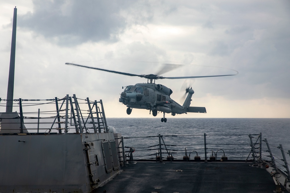 Sailors Aboard USS Ralph Johnson (DDG 114) Conducts Flight Operations