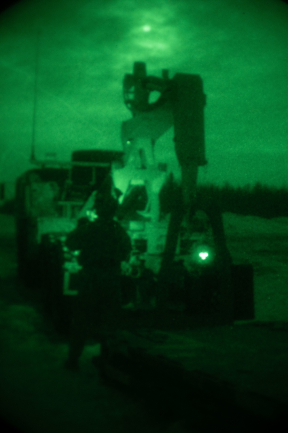 M984 Wrecker Transports Equipment During a Sling Load Operation