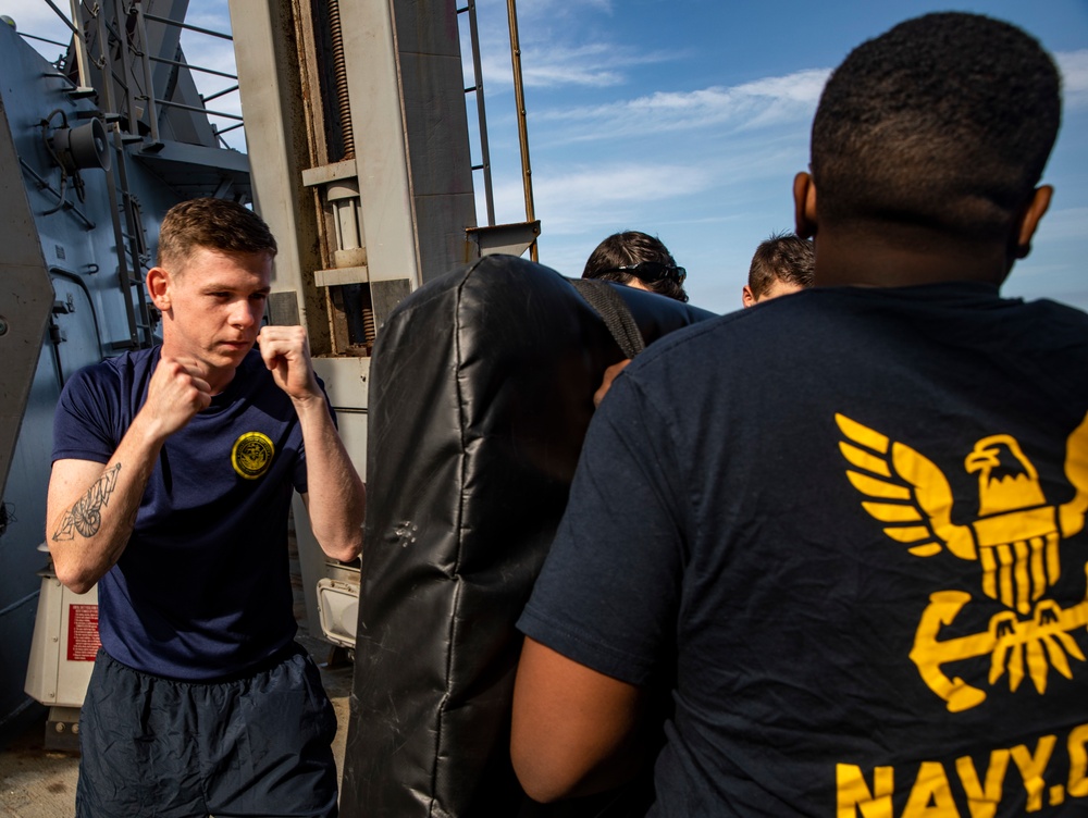 Sailors Aboard USS Ralph Johnson (DDG 114) Conduct Non-Lethal Weapons Training