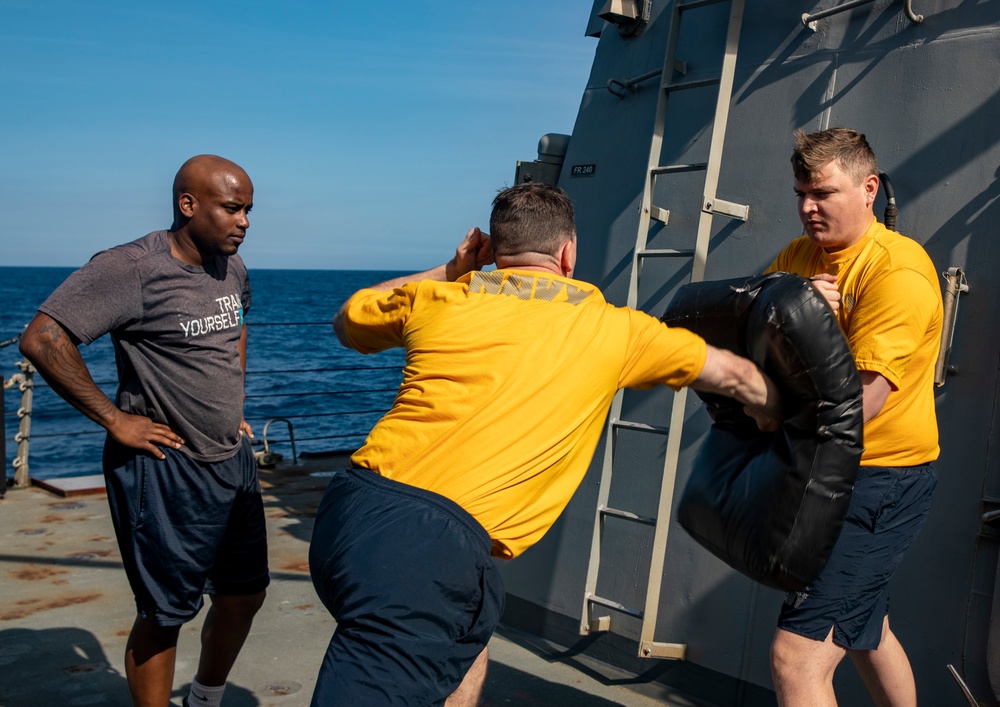 Sailors Aboard USS Ralph Johnson (DDG 114) Conduct Non-Lethal Weapons Training