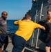 Sailors Aboard USS Ralph Johnson (DDG 114) Conduct Non-Lethal Weapons Training