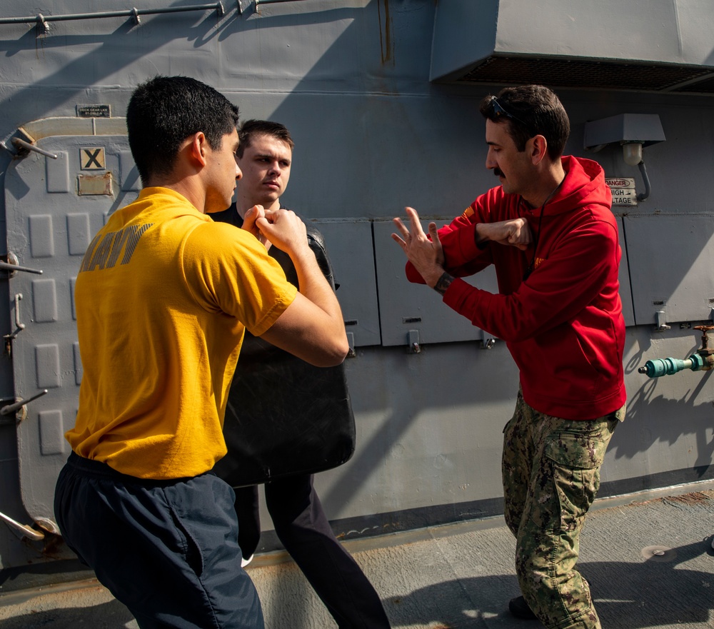 Sailors Aboard USS Ralph Johnson (DDG 114) Conduct Non-Lethal Weapons Training