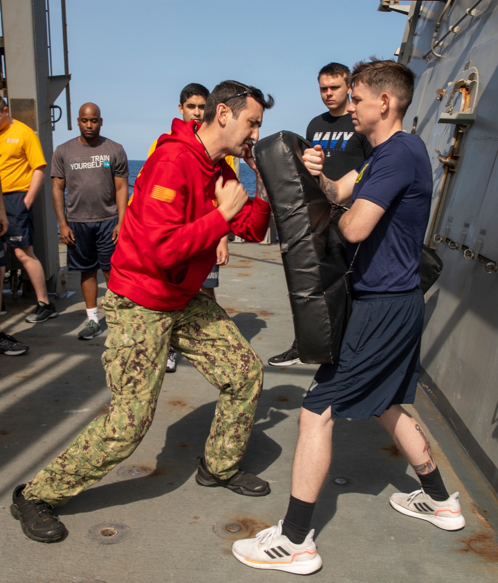 Sailors Aboard USS Ralph Johnson (DDG 114) Conduct Non-Lethal Weapons Training