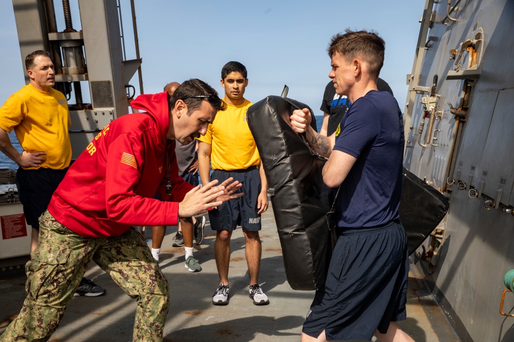 Sailors Aboard USS Ralph Johnson (DDG 114) Conduct Non-Lethal Weapons Training