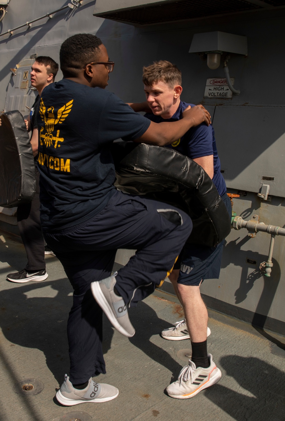 Sailors Aboard USS Ralph Johnson (DDG 114) Conduct Non-Lethal Weapons Training