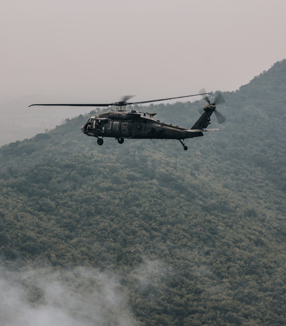 25th CAB soldiers practice aerial formation flight