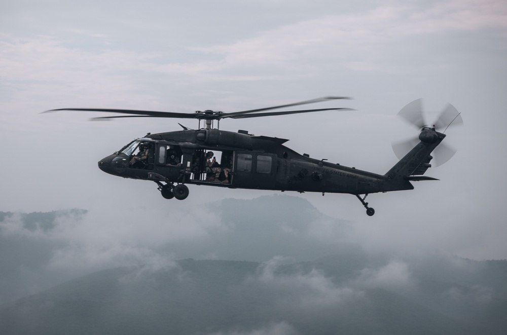 25th CAB soldiers practice aerial formation flight