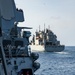 Sailors Aboard USS Ralph Johnson (DDG 114) Conduct Replenishment-at-Sea with USNS Matthew Perry (T-AKE-9)