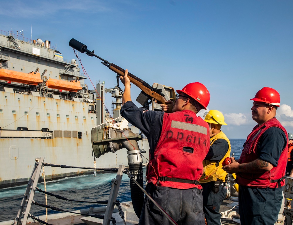 Sailors Aboard USS Ralph Johnson (DDG 114) Conduct Replenishment-at-Sea with USNS Matthew Perry (T-AKE-9)