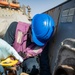 Sailors Aboard USS Ralph Johnson (DDG 114) Conduct Replenishment-at-Sea with USNS Matthew Perry (T-AKE-9)