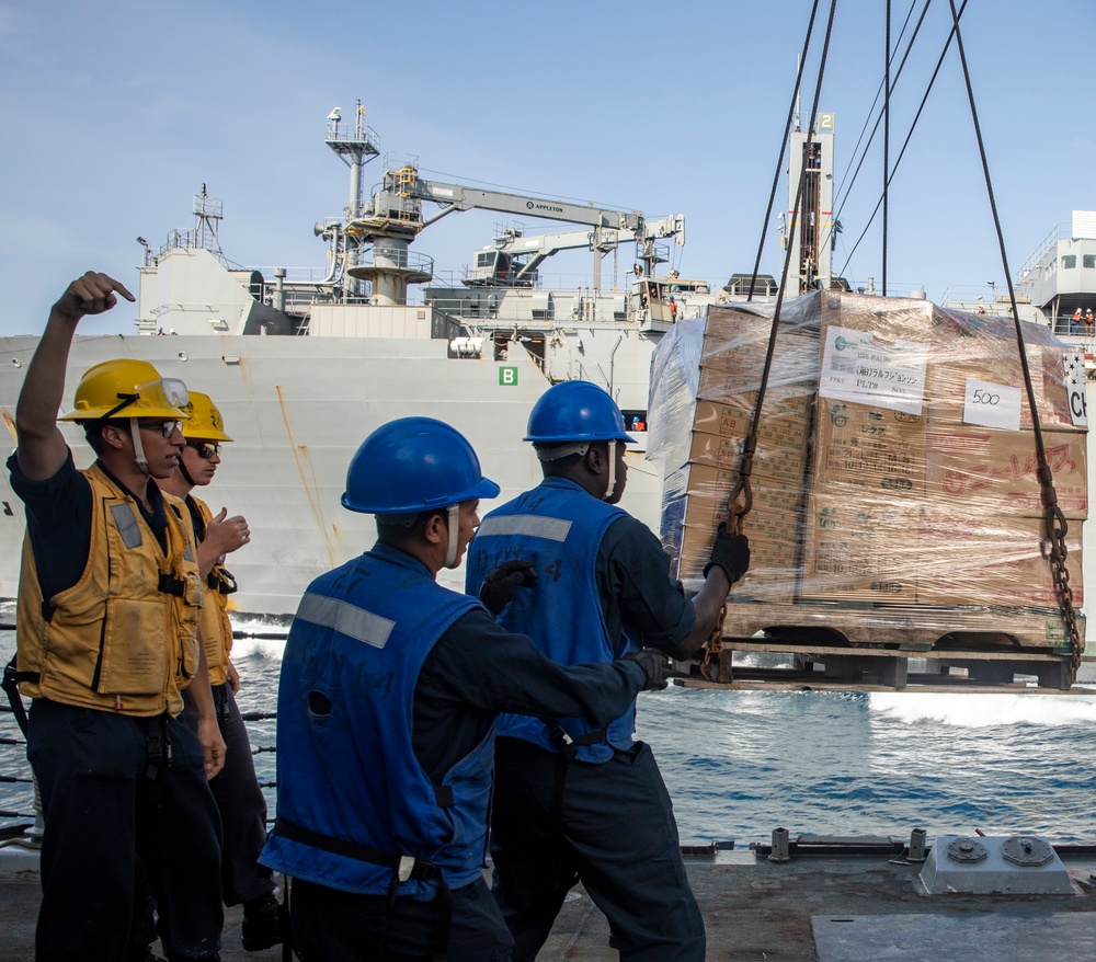 Sailors Aboard USS Ralph Johnson (DDG 114) Conduct Replenishment-at-Sea with USNS Matthew Perry (T-AKE-9)