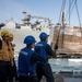 Sailors Aboard USS Ralph Johnson (DDG 114) Conduct Replenishment-at-Sea with USNS Matthew Perry (T-AKE-9)