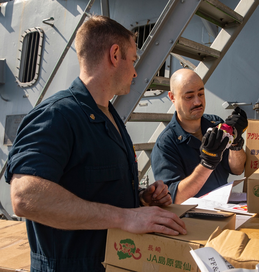 Sailors Aboard USS Ralph Johnson (DDG 114) Conduct Replenishment-at-Sea with USNS Matthew Perry (T-AKE-9)