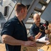 Sailors Aboard USS Ralph Johnson (DDG 114) Conduct Replenishment-at-Sea with USNS Matthew Perry (T-AKE-9)