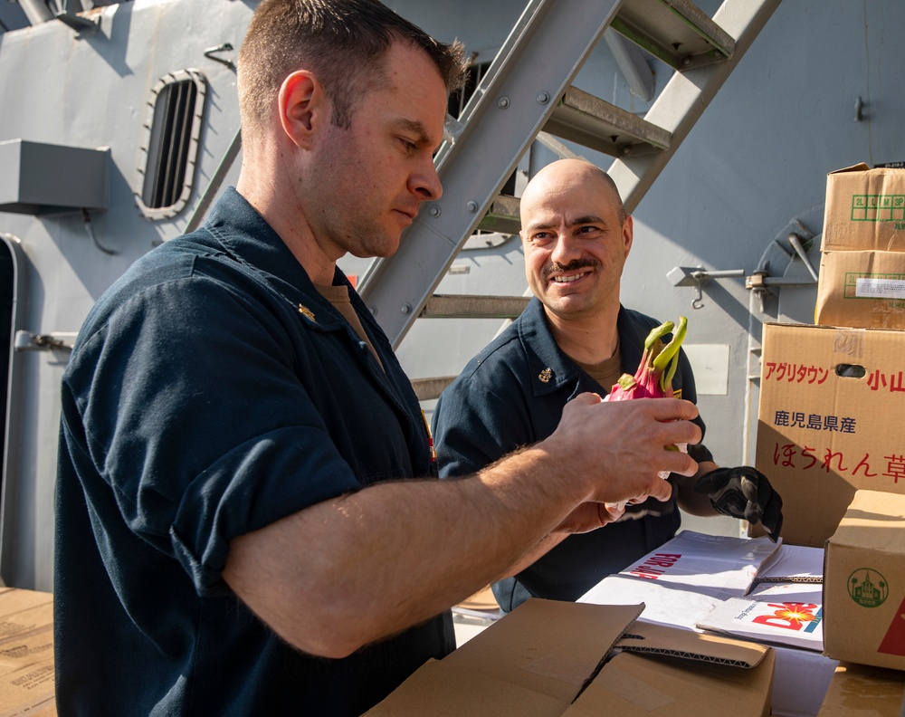 Sailors Aboard USS Ralph Johnson (DDG 114) Conduct Replenishment-at-Sea with USNS Matthew Perry (T-AKE-9)