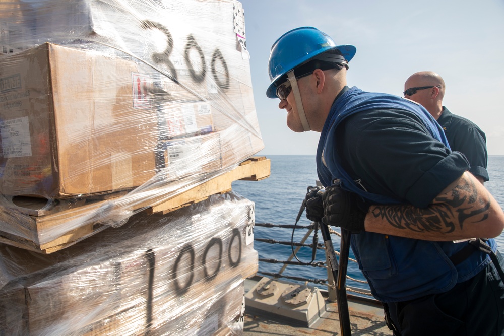 Sailors Aboard USS Ralph Johnson (DDG 114) Conduct Replenishment-at-Sea with USNS Matthew Perry (T-AKE-9)