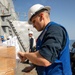 Sailors Aboard USS Ralph Johnson (DDG 114) Conduct Replenishment-at-Sea with USNS Matthew Perry (T-AKE-9)