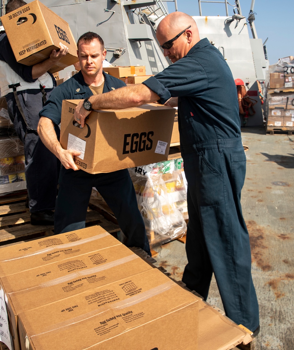Sailors Aboard USS Ralph Johnson (DDG 114) Conduct Replenishment-at-Sea with USNS Matthew Perry (T-AKE-9)