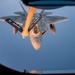 340th EARS refuels F-22s at sunset