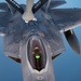 340th EARS refuels F-22s at sunset