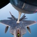 340th EARS refuels F-22s at sunset