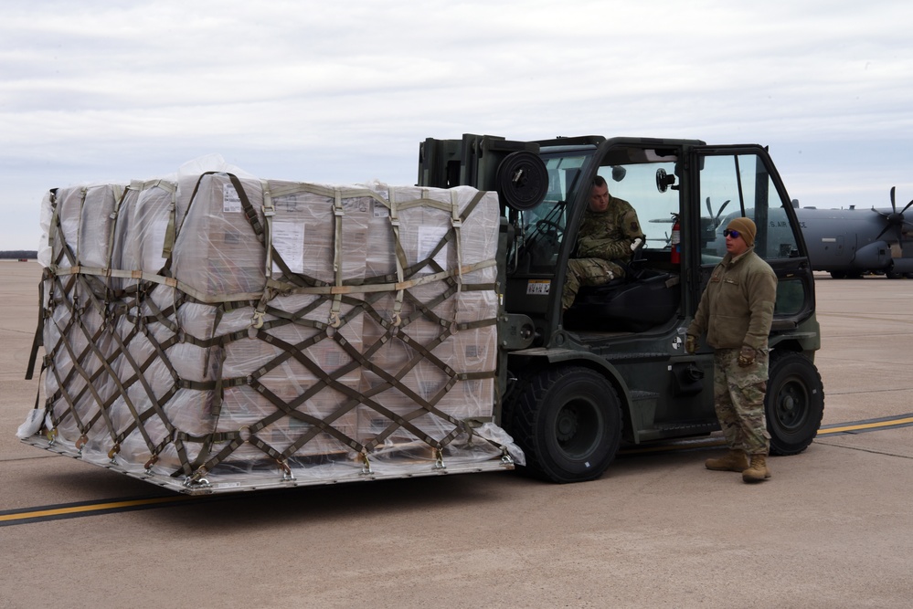 Dyess Airmen Load Humanitarian Cargo