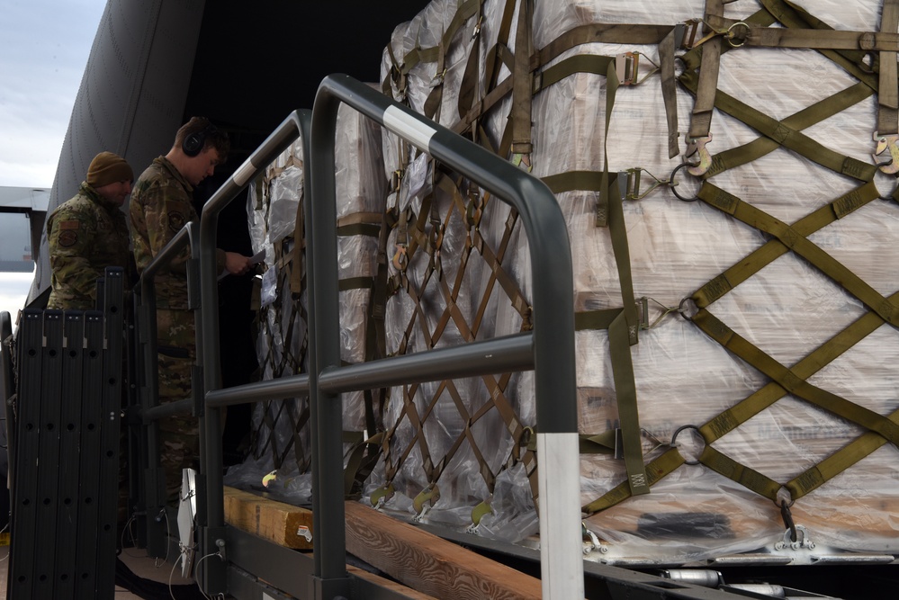 Dyess Airmen Load Humanitarian Cargo